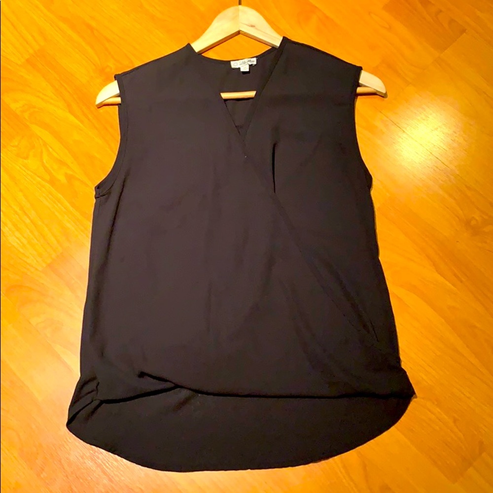 Black sleeveless Lily White Top wrap across front